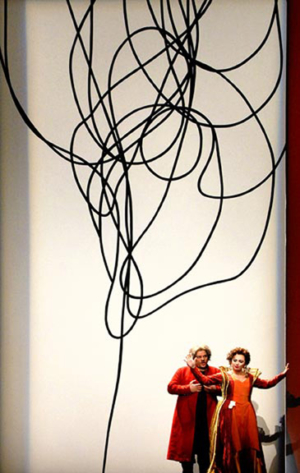 "THE HANGING GARDENS OF BABYLON" with Zelijko Lucic as Nabucco and Anna Shafajinskaia as Abigaille.
photo by Nan Coulter
NABUCCO by Verdi, sets and costume design by Frances Bagley and Tom Orr for the 50th Anniversary season of the Dallas Opera. THE HANGING GARDENS OF BABYLON with Zelijko Lucic as Nabucco and Anna Shafajinskaia as Abigaille. photo by Nan Coulter NABUCCO by Verdi, sets and costume design by Frances Bagley and Tom Orr for the 50th Anniversary season of the Dallas Opera.